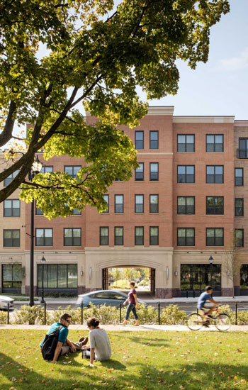 A busy city street next to The Merc apartments